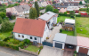 Haus wird mit Wärmepumpe System E LA 1118CP beheizt